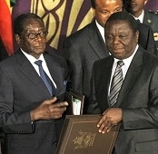 Germany welcomes Tsvangirai, warns Mugabe 